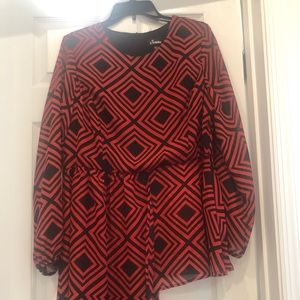Red and black high low blouse